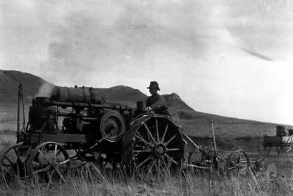 John Symons breaks new ground in Sheridan County, around 1920, on his 1916 Avery model 8-16 tractor. Sheridan County Museum.