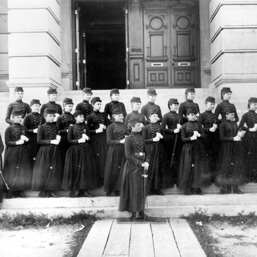 Company K on the Capitol steps, July 22, 1890. Emma O’Brien is in front with her sword; Frank Stitzer is in the inset, Wyoming State Archives. 