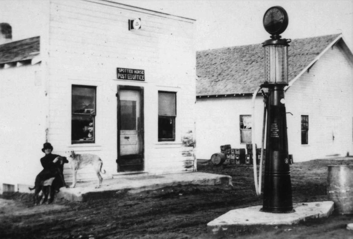 A survey conducted by the Wyoming State Highway Department rerouted the Black and Yellow trail to loop north between Gillette and Buffalo, passing through Spotted Horse (depicted here in the late 1920s).  The general store and post office were burned and rebuilt, and the dance hall at right succumbed to a tornado in 1944, but today a traveler will still find a general store and the famous spotted horse. Campbell County Rockpile Museum.