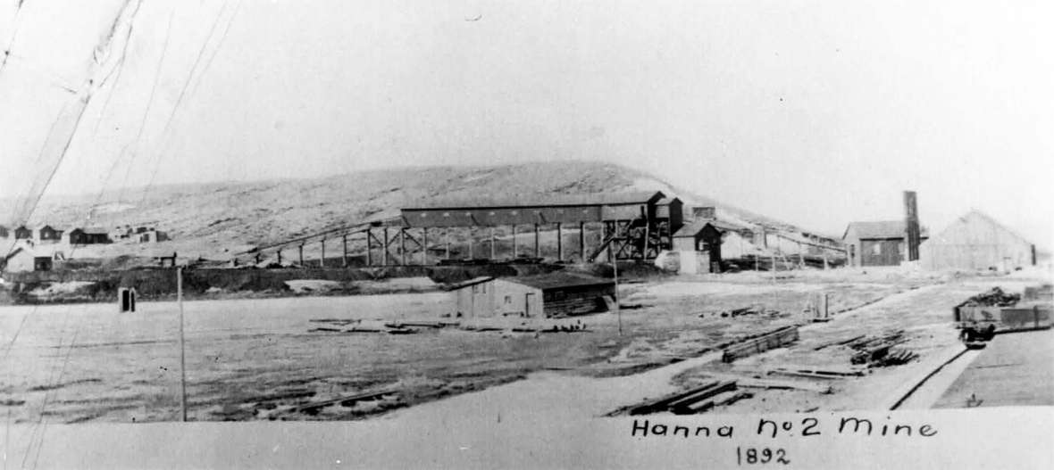 No photos of Dana have been identified. This 1892 image of the No. 2 mine in nearby Hanna, shows what area mining camps looked like. A coal tipple stands in the center of the photo with company housing visible in the distance at left.  Sweetwater County Historical Museum.