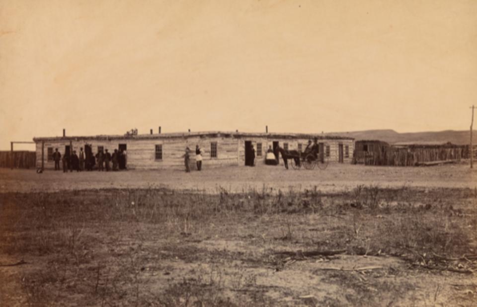 Brown’s Hotel at Fort Laramie, 1868, where Gardner may have socialized. The man in the foreground may be Alexander Gardner himself. Sherman collection of Gardner photographs, NMAI.