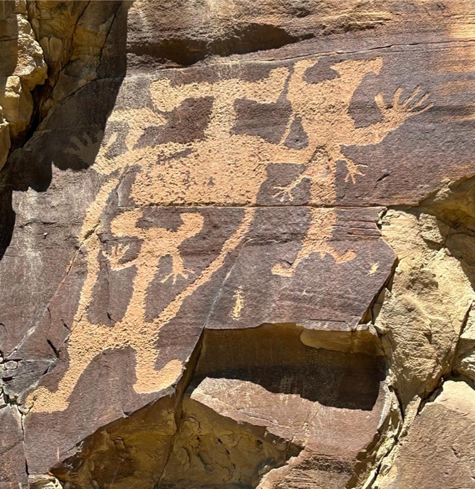 Archaeologists now understandthat rock pictures like these petroglyphs at Legend Rock have for a long time been used as sources of spiritual power. Tom Rea photo.